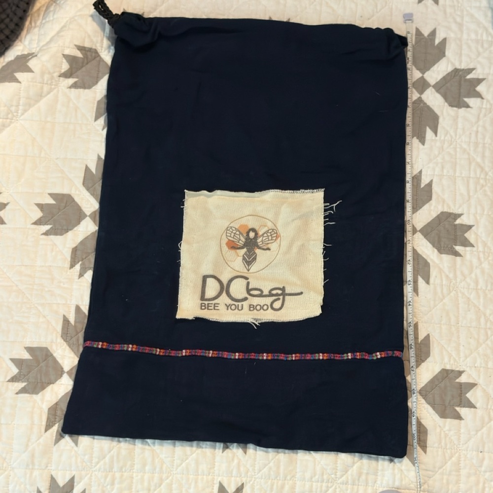 New navy DC drawstring bag